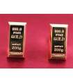 Boutons de manchette representant de l'or en barre